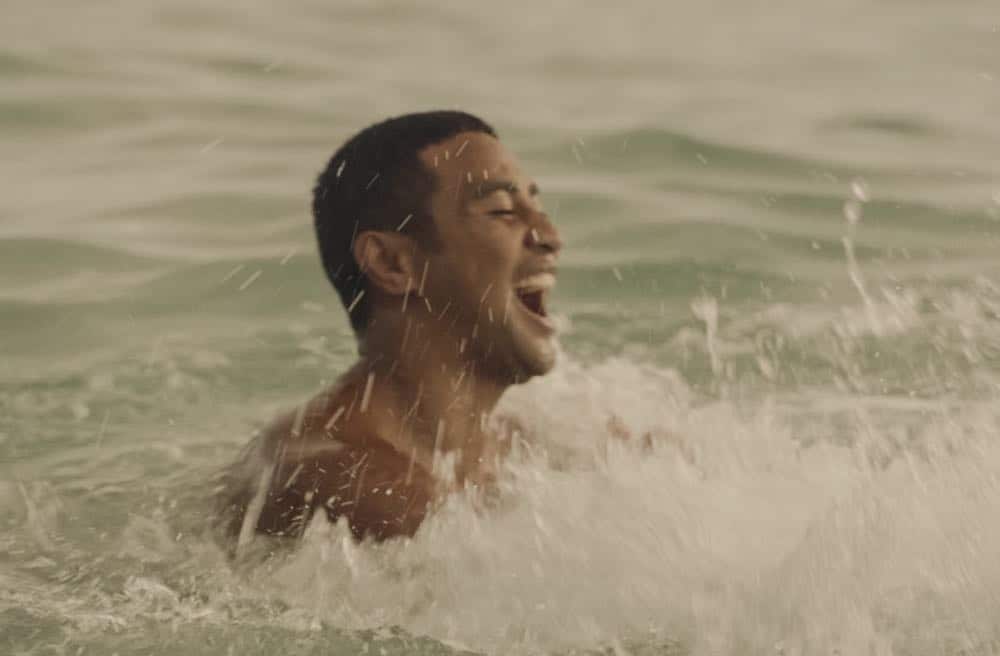 "Mimiki ke kai, ahuwale ka papa leho" -- Crime spikes when a heat wave hits Oahu, causing McGarrett and Danny to hunt down a bank thief, and Tani and Junior's car is stolen while they're on duty. Also, Grover plays the golf game of a lifetime, and Kamekona incites a riot by price-gouging on his shave ice, on HAWAII FIVE-0, Friday, Oct. 12 (9:00-10:00 PM, ET/PT) on the CBS Television Network.Pictured: Beulah Koale as Junior Reigns. Photo: Screengrab/CBS é2018 CBS Broadcasting, Inc. All Rights Reserved ("Mimiki ke kai, ahuwale ka papa leho" is Hawaiian for "When the Sea Draws Out the Tidal Wave, the Rocks Where the Cowries Hide Are Exposed")