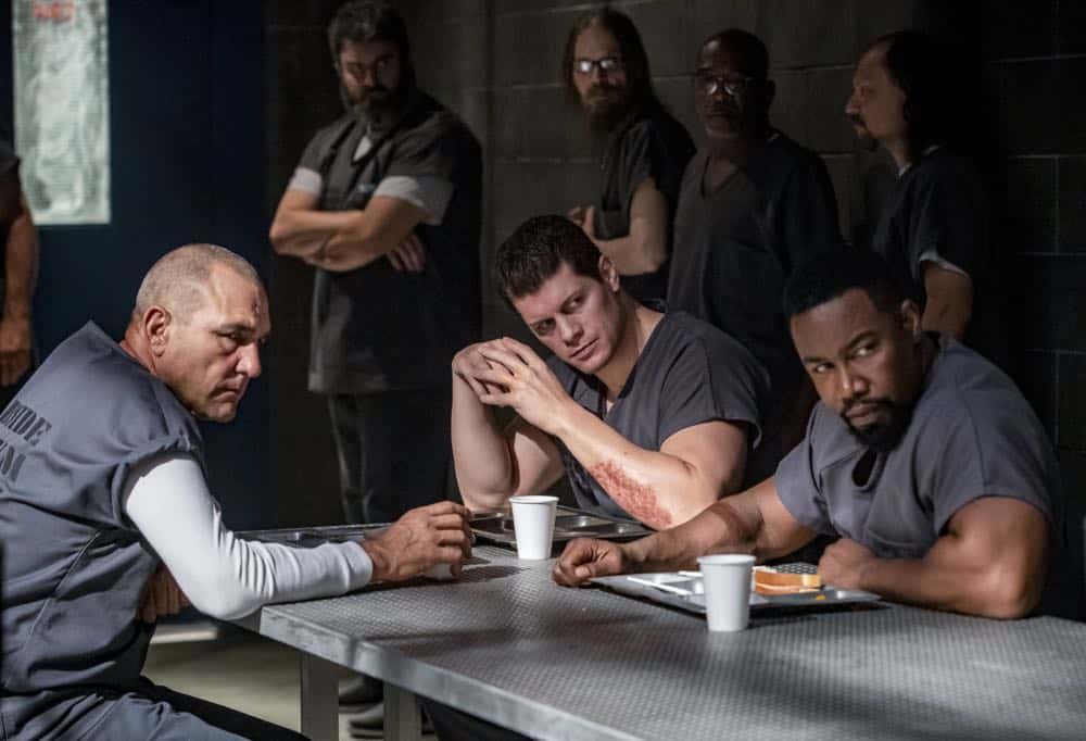 Arrow -- "Inmate #4587" -- Image Number: AR701b_0073b -- Pictured (L-R): Vinnie Jones as Danny "Brick" Brickwell, Cody Runnels as Derek Sampson and Michael Jai White as Ben Turner/Bronze Tiger -- Photo: Jack Rowand/The CW -- é 2018 The CW Network, LLC. All Rights Reserved.