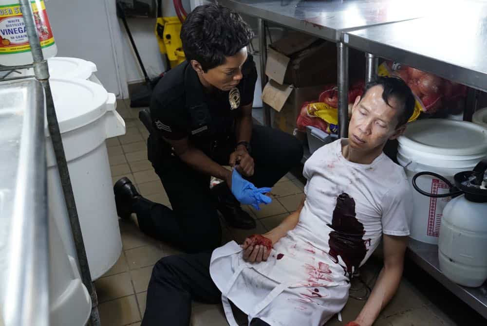 9-1-1: L-R: Angela Bassett and guest star Peter Boon Koh in the “Awful People” episode of 9-1-1 airing Monday, Oct. 15 (9:00-10:00 PM ET/PT) on FOX. © 2018 FOX Broadcasting. CR: Greg Gayne / FOX.
