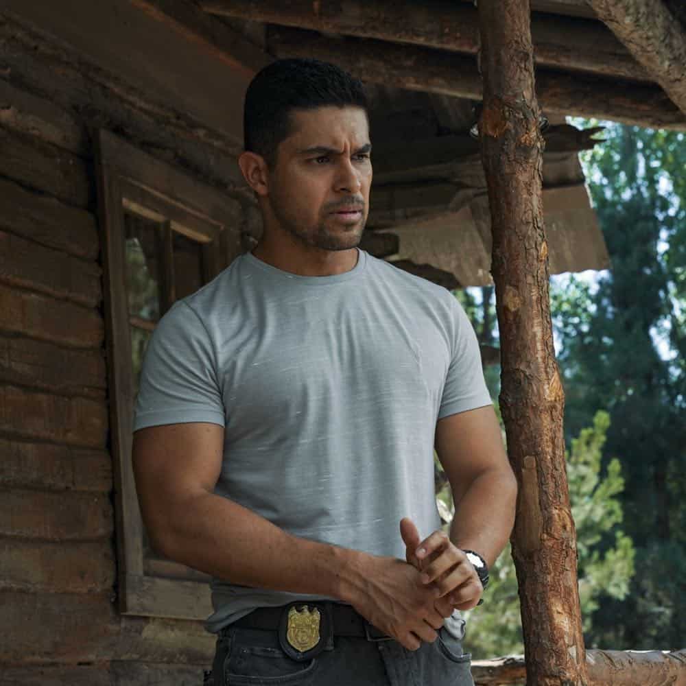 ÃÂThird WheelààGibbsàquiet vacation at his remote cabin is interrupted by a surprise visit from Tobias Fornell (Joe Spano) and Navy Captain Phillip Brooks (Don Lake), as well as a call from NCIS asking for his help locating a robber hiding in the woods near him, on NCIS, Tuesday, Oct. 16 (8:00-9:00 PM, ET/PT) on the CBS Television Network. Pictured: Wilmer Valderrama. Photo: Sonja Flemming/CBS é2018 CBS Broadcasting, Inc. All Rights Reserved