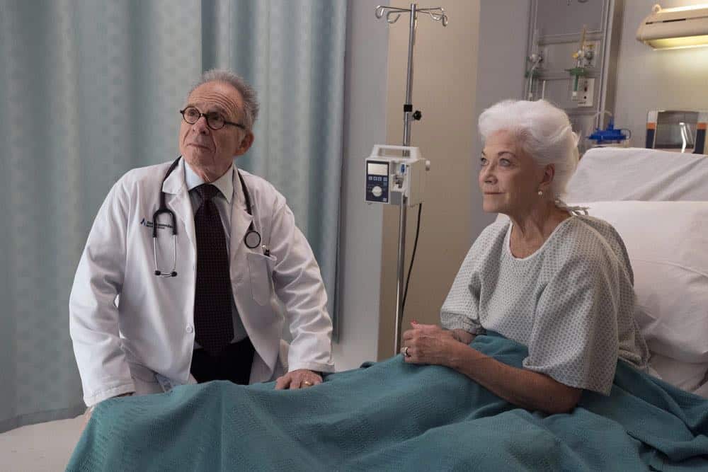 NEW AMSTERDAM -- "Boundaries" Episode 104 -- Pictured: (l-r) Ron Rifkin as Dean Peter Fulton, Linda Thorson as Denise Monaghan -- (Photo by: Virginia Sherwood/NBC) NEW AMSTERDAM -- "Boundaries" Episode 104 -- Pictured: (l-r) Ron Rifkin as Dean Peter Fulton, Linda Thorson as Denise Monaghan -- (Photo by: Virginia Sherwood/NBC)