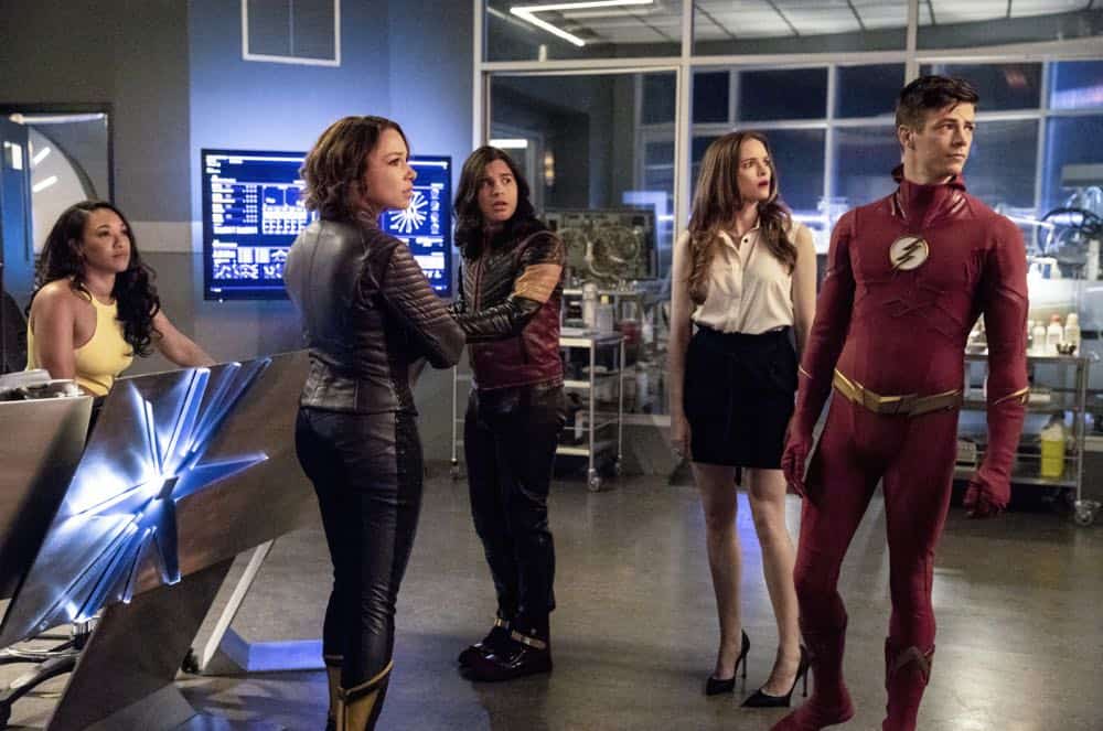 The Flash -- "Blocked" -- Image Number: FLA502a_0151b.jpg -- Pictured (L-R): Candice Patton as Iris West - Allen, Jessica Parker Kennedy as Nora West -Allen/XS, Carlos Valdes as Cisco Ramon/Vibe, Danielle Panabaker as Caitlin Snow and Grant Gustin as Barry Allen/ The Flash -- Photo: Jack Rowand/The CW -- é 2018 The CW Network, LLC. All rights reserved
