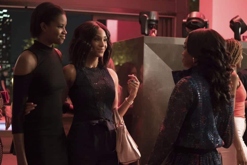 Black Lightning -- "The Book Of Consequences: Chapter Two: Black Jesus Blues" -- Image BLK202b_0022b.jpg -- Pictured (L-R): Shein Mompremier as Chenoa and Nafessa Williams as Anissa -- Photo: Annette Brown/The CW -- é 2018 The CW Network, LLC. All rights reserved