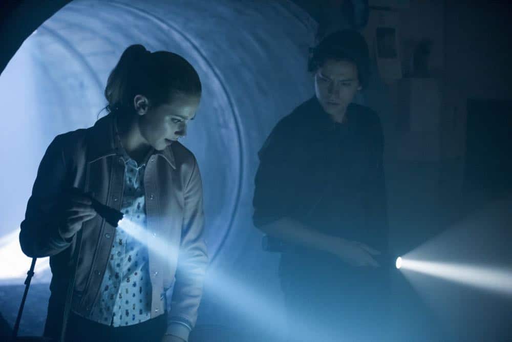 Riverdale -- "Chapter Thirty-Seven: Fortune and Men's Eyes" -- Image Number: RVD302a_0047.jpg -- Pictured (L-R): Lili Reinhart as Betty and Cole Sprouse as Jughead -- Photo: Dean Buscher/The CW -- é 2018 The CW Network, LLC. All rights reserved. Riverdale -- "Chapter Thirty-Seven: Fortune and Men's Eyes" -- Image Number: RVD302a_0047.jpg -- Pictured (L-R): Lili Reinhart as Betty and Cole Sprouse as Jughead -- Photo: Dean Buscher/The CW -- é 2018 The CW Network, LLC. All rights reserved.