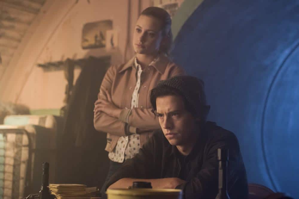 Riverdale -- "Chapter Thirty-Seven: Fortune and Men's Eyes" -- Image Number: RVD302a_0190.jpg -- Pictured (L-R): Lili Reinhart as Betty and Cole Sprouse as Jughead -- Photo: Dean Buscher/The CW -- é 2018 The CW Network, LLC. All rights reserved. Riverdale -- "Chapter Thirty-Seven: Fortune and Men's Eyes" -- Image Number: RVD302a_0190.jpg -- Pictured (L-R): Lili Reinhart as Betty and Cole Sprouse as Jughead -- Photo: Dean Buscher/The CW -- é 2018 The CW Network, LLC. All rights reserved.