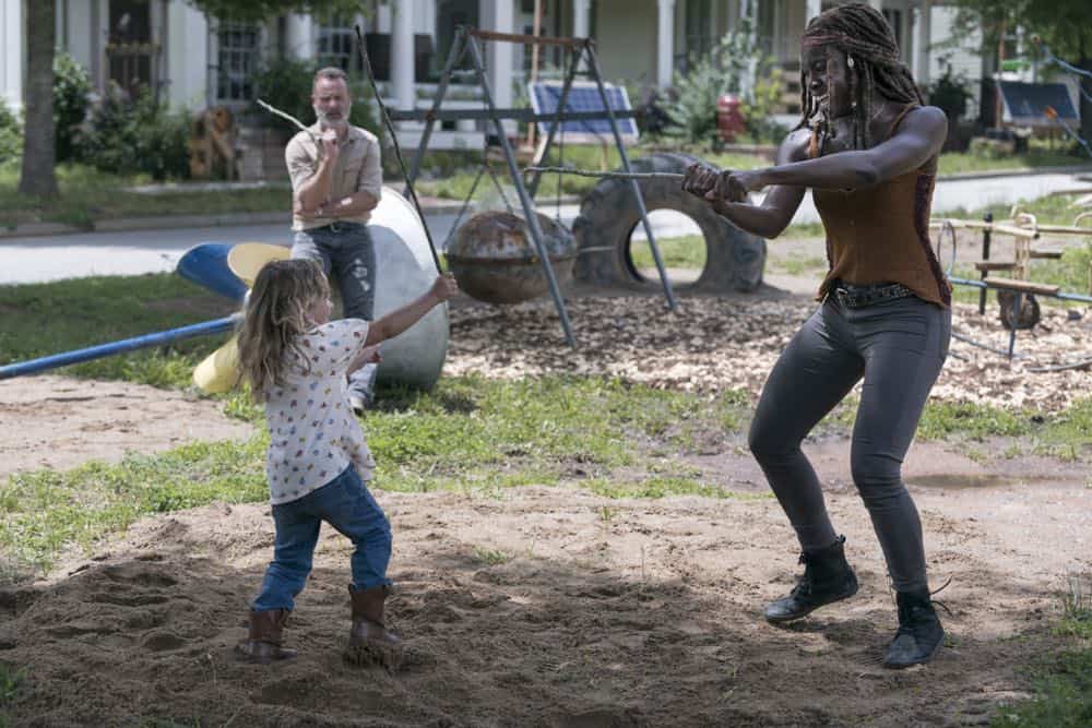 Andrew Lincoln as Rick Grimes, Chloe Garcia-Frizzi as Judith Grimes, Danai Gurira as Michonne - The Walking Dead _ Season 9, Episode 3 - Photo Credit: Gene Page/AMC