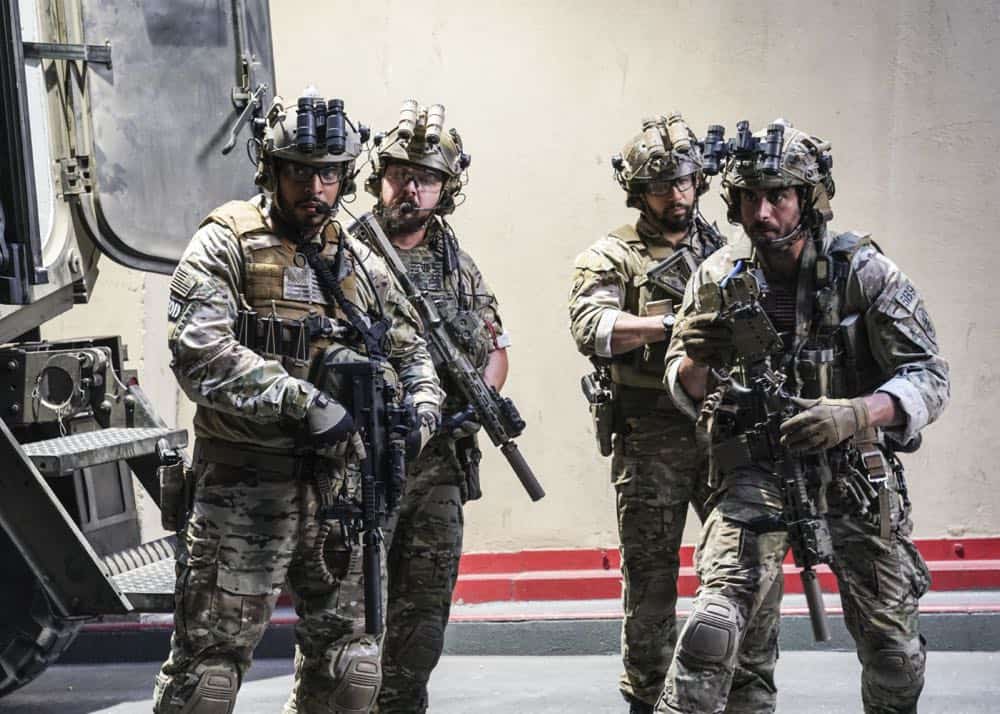 "The Worst of Conditions" -- After tragedy strikes, Jason is faced with a huge decision regarding his future with Bravo Team, on SEAL TEAM, Wednesday, Oct. 17 (9:00-10:00 PM, ET/PT) on the CBS Television Network. Pictured: Ruffin Prentiss as Summer Kairos, AJ Buckley as Sonny Quinn, Neil Brown Jr. as Ray Perry, Justin Melnick as Brock. Photo: MontyBrinton/CBS é2018 CBS Broadcasting, Inc. All Rights Reserved