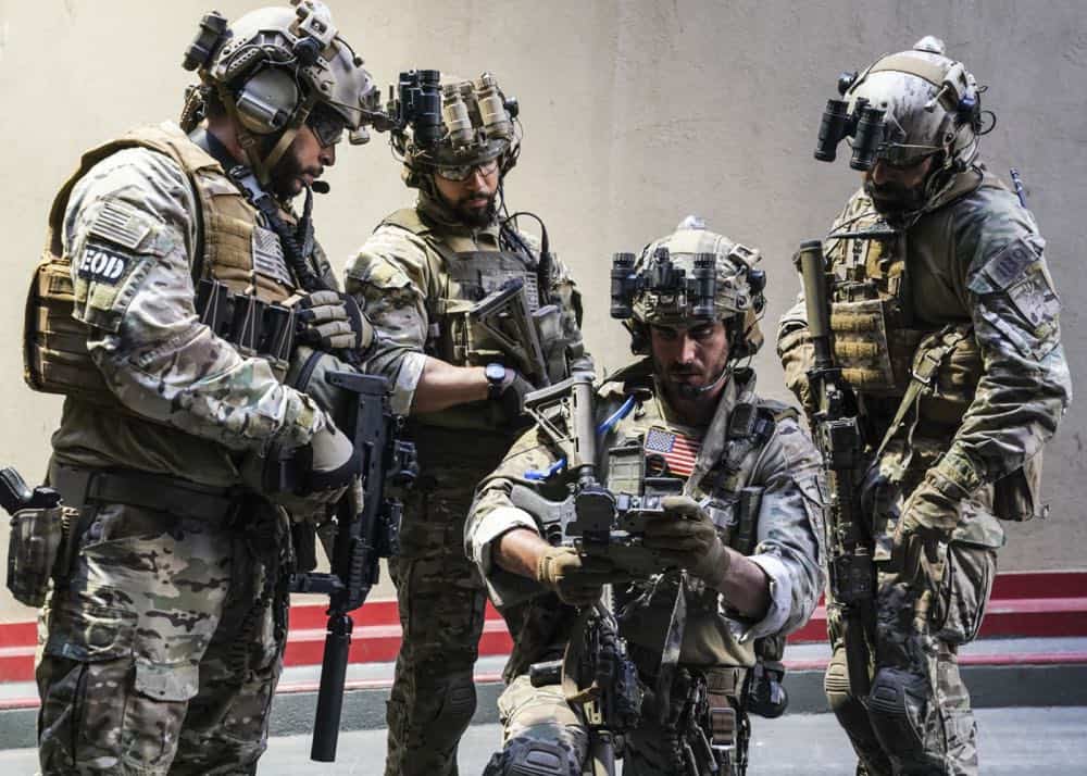 "The Worst of Conditions" -- After tragedy strikes, Jason is faced with a huge decision regarding his future with Bravo Team, on SEAL TEAM, Wednesday, Oct. 17 (9:00-10:00 PM, ET/PT) on the CBS Television Network. Pictured: Ruffin Prentiss as Summer Kairos, Neil Brown Jr. as Ray Perry, Justin Melnick as Brock and Michael Irby as Adam. Photo: MontyBrinton/CBS é2018 CBS Broadcasting, Inc. All Rights Reserved