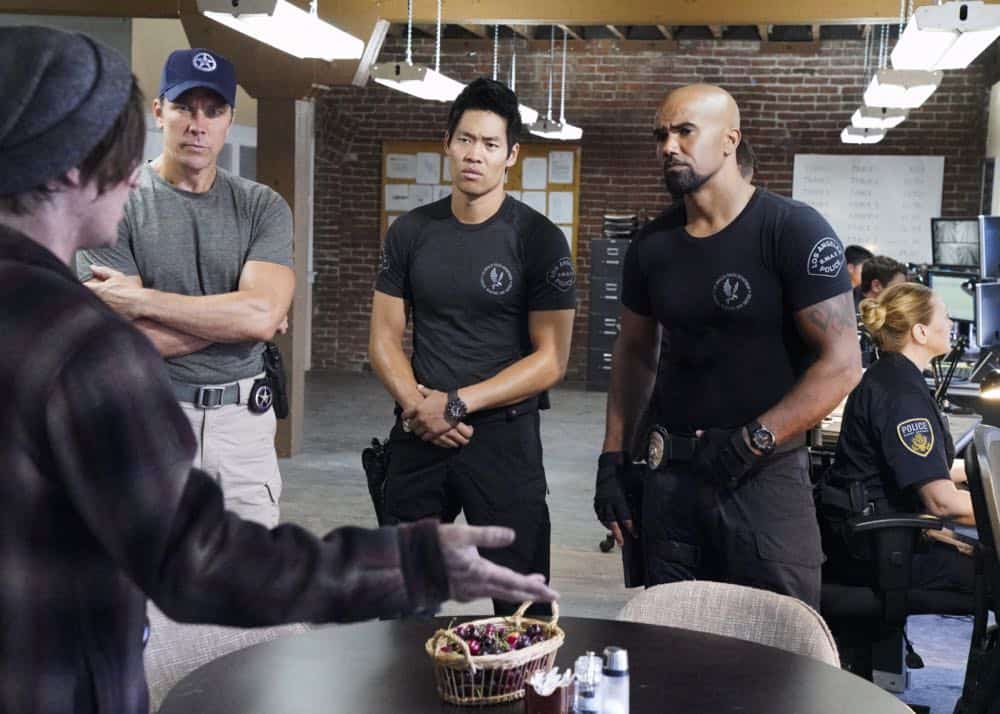 "Saving Face" -- Hondo suspects ulterior motive when the estranged U.S. Marshal husband (Michael Trucco) of his romantic interest, Deputy District Attorney Nia Wells (Nikiva Dionne), requests the S.W.A.T. team's help with the apprehension of a fugitive robbing drug cargo shipments. Also, Jessica is forced to implement departmental budget cuts as Street makes a heartbreaking discovery about his mother Karen (Sherilyn Fenn) on, on S.W.A.T., Thursday, Oct. 18 (10:00-11:00 PM, ET/PT) on the CBS Television Network. Pictured L to R: David Lim as Victor Tan and Shemar Moore as Daniel "Hondo" Harrelson. Photo: Bill Inoshita/CBS é2018 CBS Broadcasting, Inc. All Rights Reserved "Saving Face" -- Hondo suspects ulterior motive when the estranged U.S. Marshal husband (Michael Trucco) of his romantic interest, Deputy District Attorney Nia Wells (Nikiva Dionne), requests the S.W.A.T. team's help with the apprehension of a fugitive robbing drug cargo shipments. Also, Jessica is forced to implement departmental budget cuts as Street makes a heartbreaking discovery about his mother Karen (Sherilyn Fenn) on, on S.W.A.T., Thursday, Oct. 18 (10:00-11:00 PM, ET/PT) on the CBS Television Network. Pictured L to R: David Lim as Victor Tan and Shemar Moore as Daniel "Hondo" Harrelson. Photo: Bill Inoshita/CBS é2018 CBS Broadcasting, Inc. All Rights Reserved