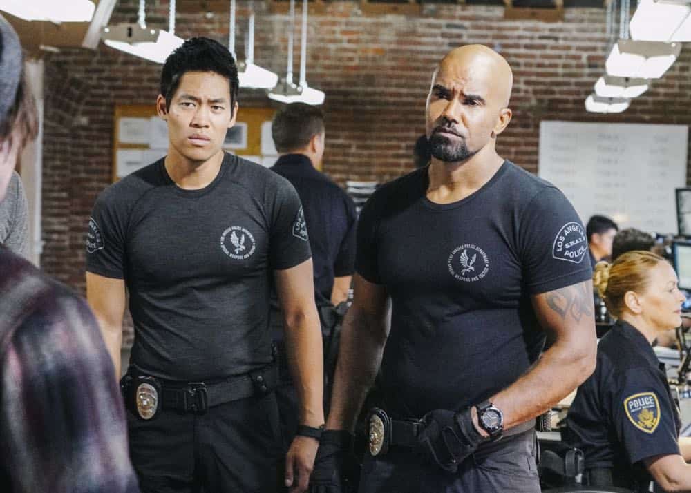 "Saving Face" -- Hondo suspects ulterior motive when the estranged U.S. Marshal husband (Michael Trucco) of his romantic interest, Deputy District Attorney Nia Wells (Nikiva Dionne), requests the S.W.A.T. team's help with the apprehension of a fugitive robbing drug cargo shipments. Also, Jessica is forced to implement departmental budget cuts as Street makes a heartbreaking discovery about his mother Karen (Sherilyn Fenn) on, on S.W.A.T., Thursday, Oct. 18 (10:00-11:00 PM, ET/PT) on the CBS Television Network. Pictured L to R: David Lim as Victor Tan and Shemar Moore as Daniel "Hondo" Harrelson. Photo: Bill Inoshita/CBS é2018 CBS Broadcasting, Inc. All Rights Reserved "Saving Face" -- Hondo suspects ulterior motive when the estranged U.S. Marshal husband (Michael Trucco) of his romantic interest, Deputy District Attorney Nia Wells (Nikiva Dionne), requests the S.W.A.T. team's help with the apprehension of a fugitive robbing drug cargo shipments. Also, Jessica is forced to implement departmental budget cuts as Street makes a heartbreaking discovery about his mother Karen (Sherilyn Fenn) on, on S.W.A.T., Thursday, Oct. 18 (10:00-11:00 PM, ET/PT) on the CBS Television Network. Pictured L to R: David Lim as Victor Tan and Shemar Moore as Daniel "Hondo" Harrelson. Photo: Bill Inoshita/CBS é2018 CBS Broadcasting, Inc. All Rights Reserved