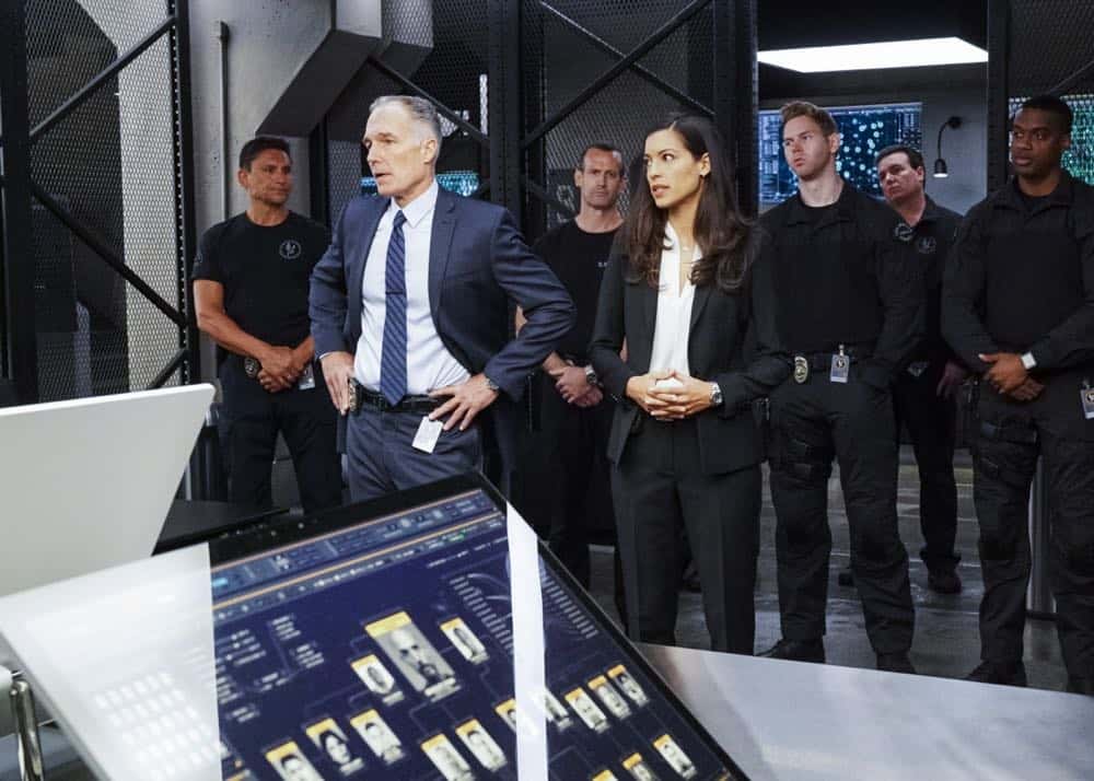 "Saving Face" -- Hondo suspects ulterior motive when the estranged U.S. Marshal husband (Michael Trucco) of his romantic interest, Deputy District Attorney Nia Wells (Nikiva Dionne), requests the S.W.A.T. team's help with the apprehension of a fugitive robbing drug cargo shipments. Also, Jessica is forced to implement departmental budget cuts as Street makes a heartbreaking discovery about his mother Karen (Sherilyn Fenn) on, on S.W.A.T., Thursday, Oct. 18 (10:00-11:00 PM, ET/PT) on the CBS Television Network. Pictured L to R: Patrick St. Esprit as Commander Robert Hicks and Stephanie Sigman as Jessica Cortez. Photo: Bill Inoshita/CBS é2018 CBS Broadcasting, Inc. All Rights Reserved