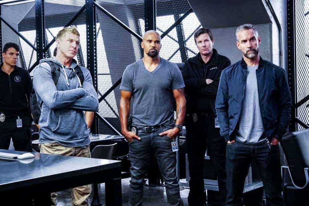 "Saving Face" -- Hondo suspects ulterior motive when the estranged U.S. Marshal husband (Michael Trucco) of his romantic interest, Deputy District Attorney Nia Wells (Nikiva Dionne), requests the S.W.A.T. team's help with the apprehension of a fugitive robbing drug cargo shipments. Also, Jessica is forced to implement departmental budget cuts as Street makes a heartbreaking discovery about his mother Karen (Sherilyn Fenn) on, on S.W.A.T., Thursday, Oct. 18 (10:00-11:00 PM, ET/PT) on the CBS Television Network. Pictured L to R: Kenny Johnson as Dominique Luca, Shemar Moore as Daniel "Hondo" Harrelson and Jay Harrington as David "Deacon" Kay. Photo: Bill Inoshita/CBS é2018 CBS Broadcasting, Inc. All Rights Reserved