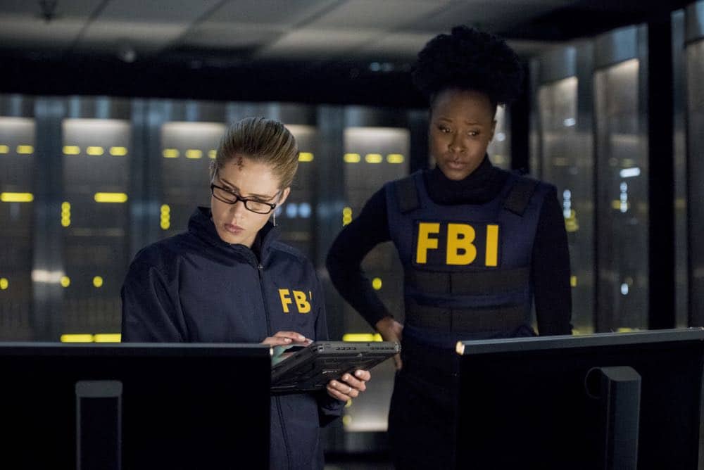 Arrow -- "Crossing Lines" -- Image Number: AR703b_0134b -- Pictured (L-R): Emily Bett Rickards as Felicity Smoak and Sydelle Noel as FBI Agent Samanda Watson -- Photo: Dean Buscher/The CW -- é 2018 The CW Network, LLC. All Rights Reserved.